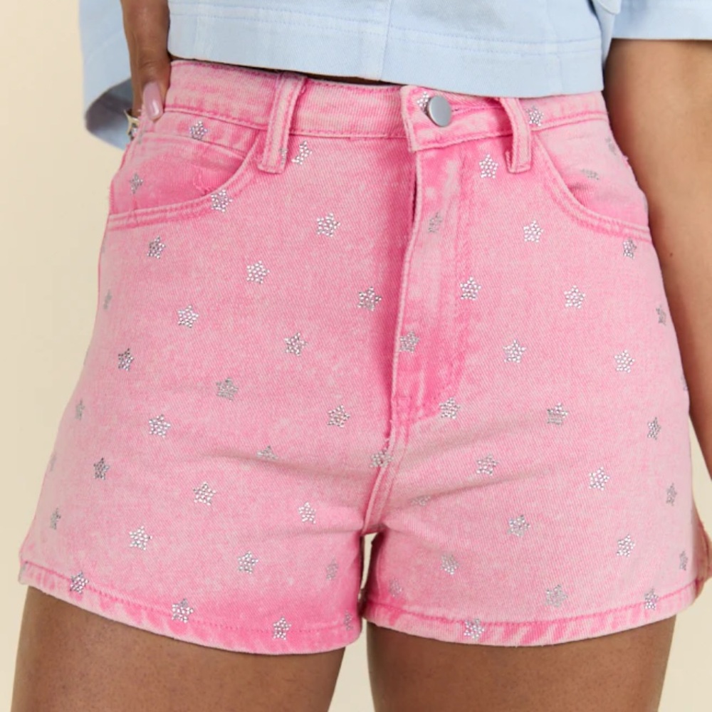 Pink denim shorts with rhinestone stars